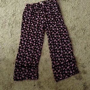 Aéropostale Pants with maroon negative space and flowers on top